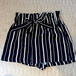 Black and white shorts.